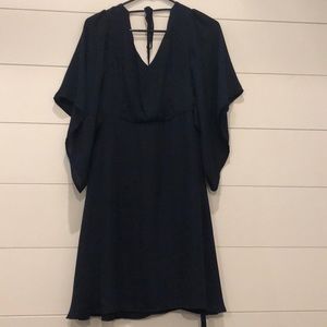 Navy dress with flowing sleeves and removable belt